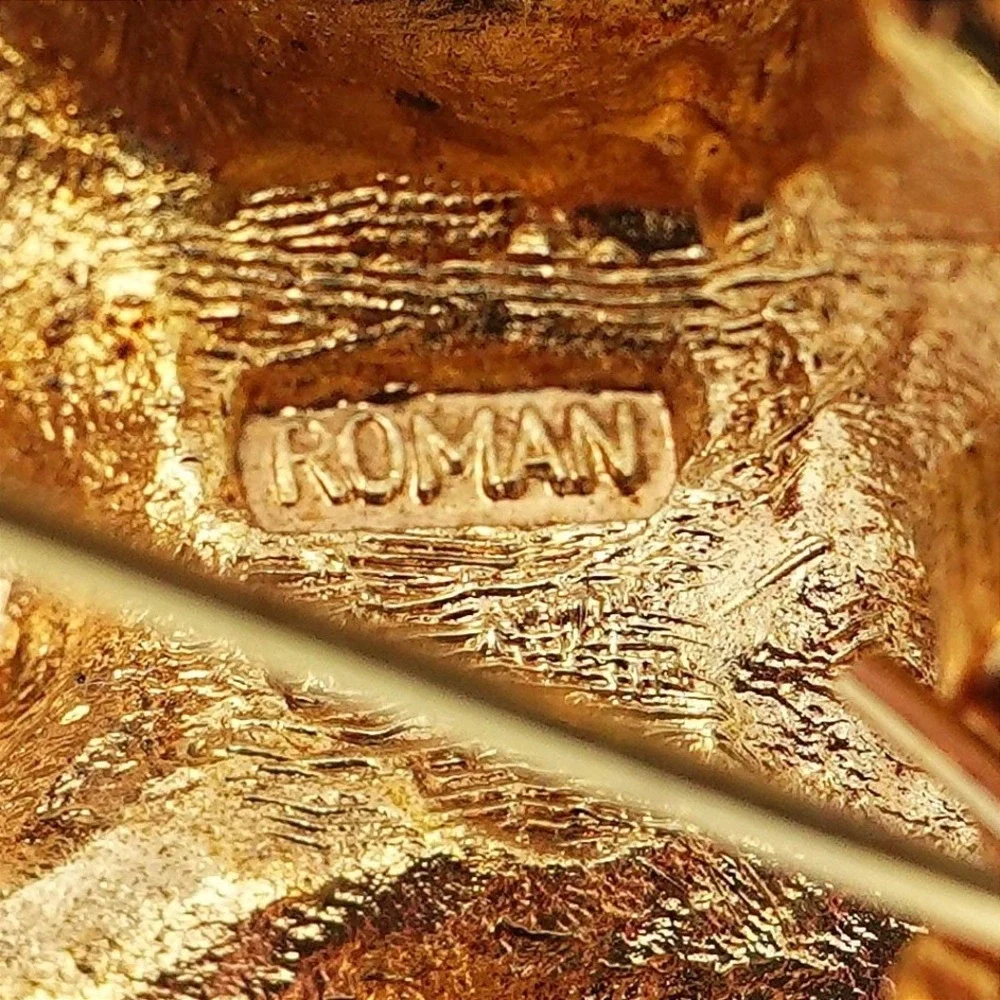 Roman pre owned